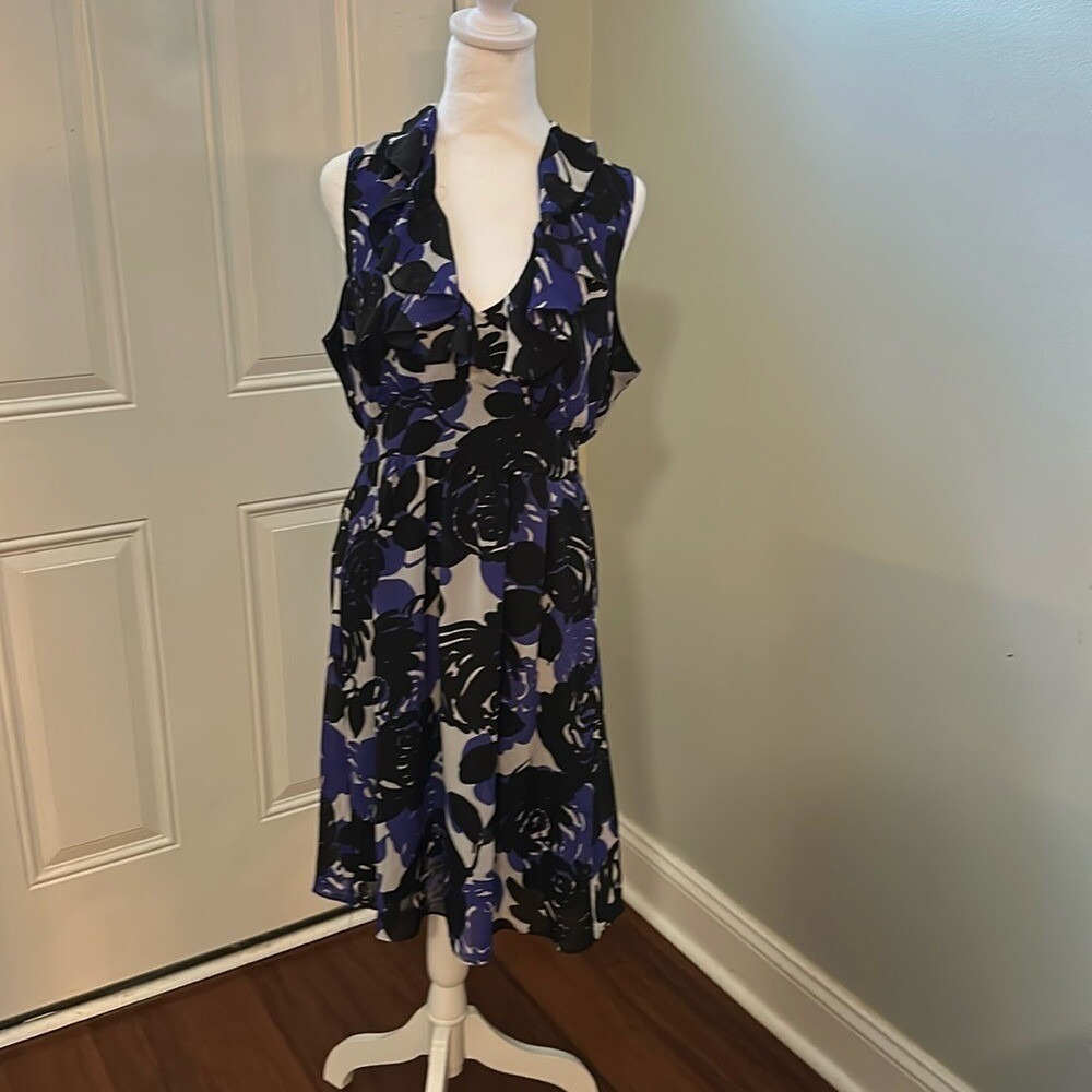 Trulli sleeveless lined ruffled color floral polyester flowy dress.